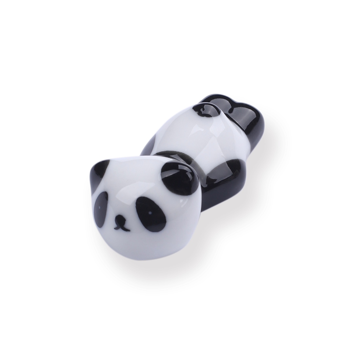 Small black and white ceramic panda brush rest